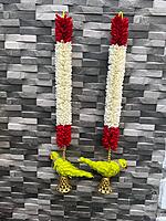 Cloth garland with parrot hangings