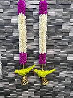 Cloth garland with parrot hangings