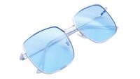Female Oversized Square Sunglasses. Silver Color Frame. Blue Color UV Protected Flat Lens.