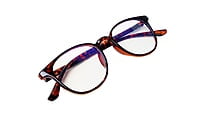 Soigné Unisex Round Medium Spectacle Frames.Leopard Print
