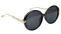 Female Oversized Round Sunglasses. Glossy Black Rim Female Oversized Round Sunglasses. Glossy Black Rim