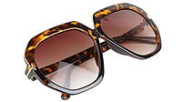 Female Oversized Sunglasses. Tortoise Print Frame.