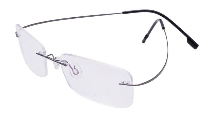 Unisex Rectangular Rimless Flexible Spectacle Frame. Grey Color Frame Unisex Rectangular Rimless Flexible Spectacle Frame. Grey Color Frame