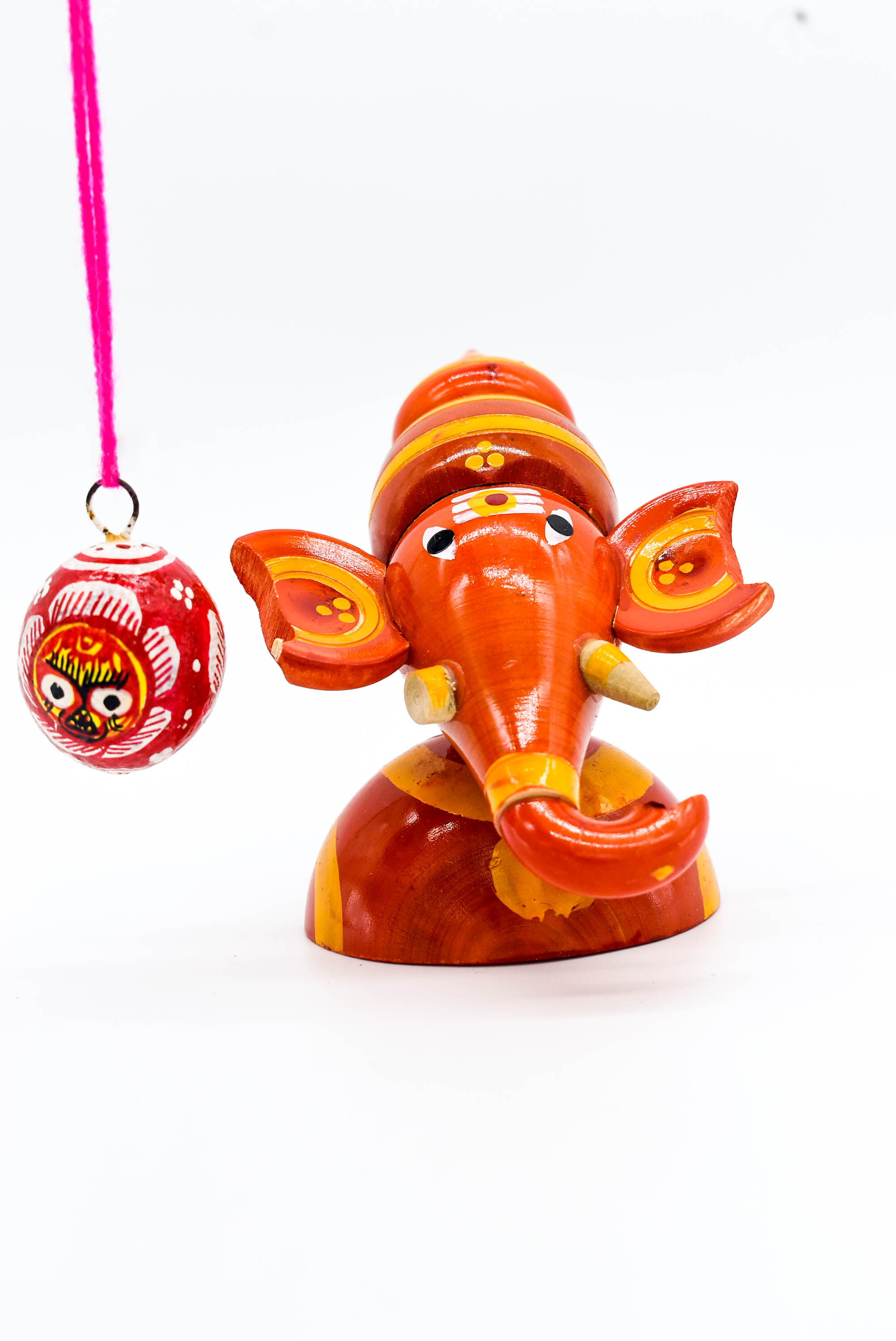 Handcrafted Indian Car Dashboard Ganesh Figurine with Jagannath Hanging Ornament on Beetle nut, multicolored