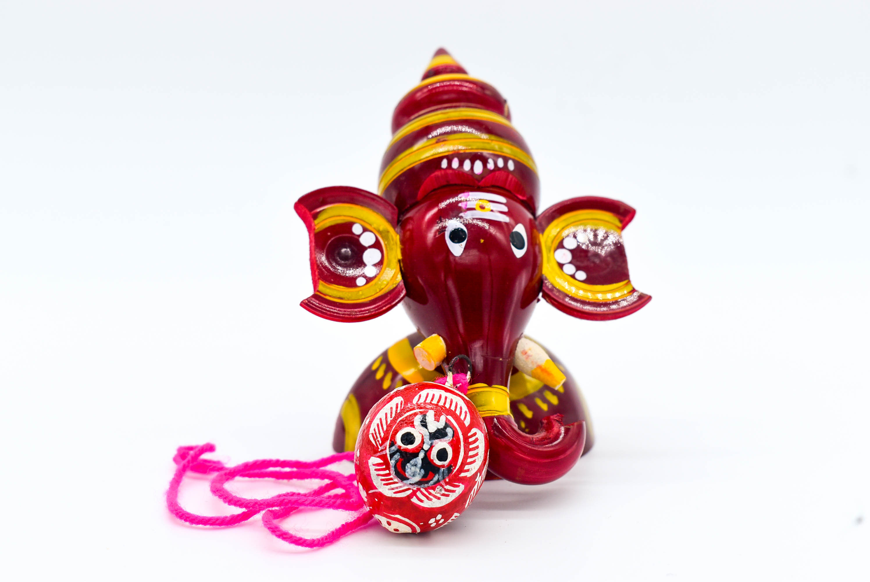 Handcrafted Indian Car Dashboard Ganesh Figurine with Jagannath Hanging Ornament on Beetle nut, multicolored