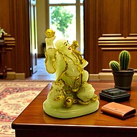 Laughing Buddha Showpiece (Golden & White) – 8 Inch