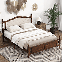 vintage-style wooden bed with an upholstered headboard