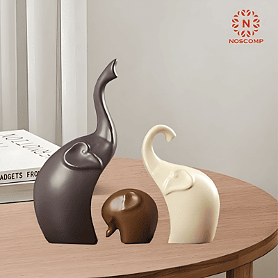 A family of three Elephants