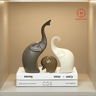 A family of three Elephants