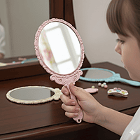 Antique Handheld Mirror with Embossed Design