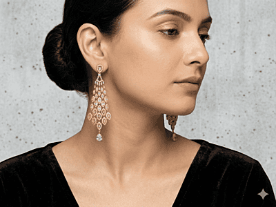 Exquisite Gold-Toned Chandelier Earrings with Pear-Cut Accents