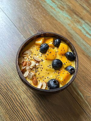 Coconut shell soup, smoothie or salad  bowl with base