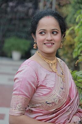 Pastel pink figure motif pure mulberry silk Swarnachari saree