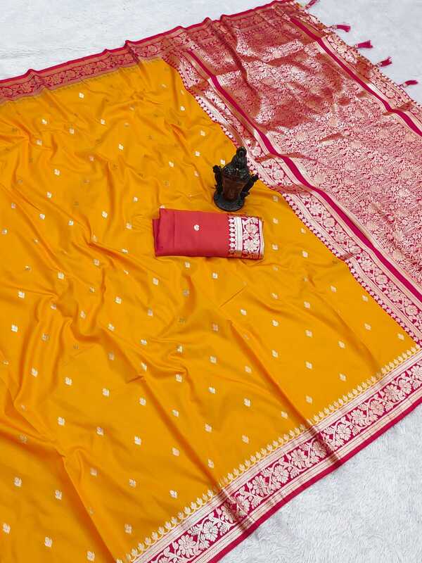 Yellow Banarasi saree with small white dot