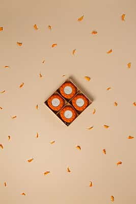 SET OF 4 ORANGE LOTUS DIYAS