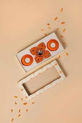 SET OF ORANGE DIYAS & RANGOLI
