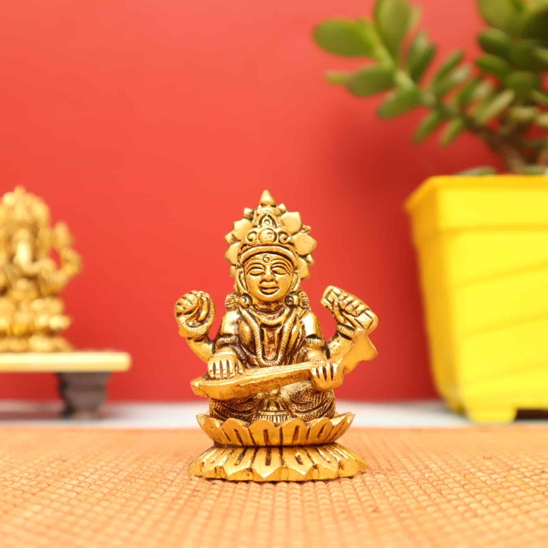 Auspicious Saraswati Devi Idol sitting on Lotus in Brass - 3 inch Height