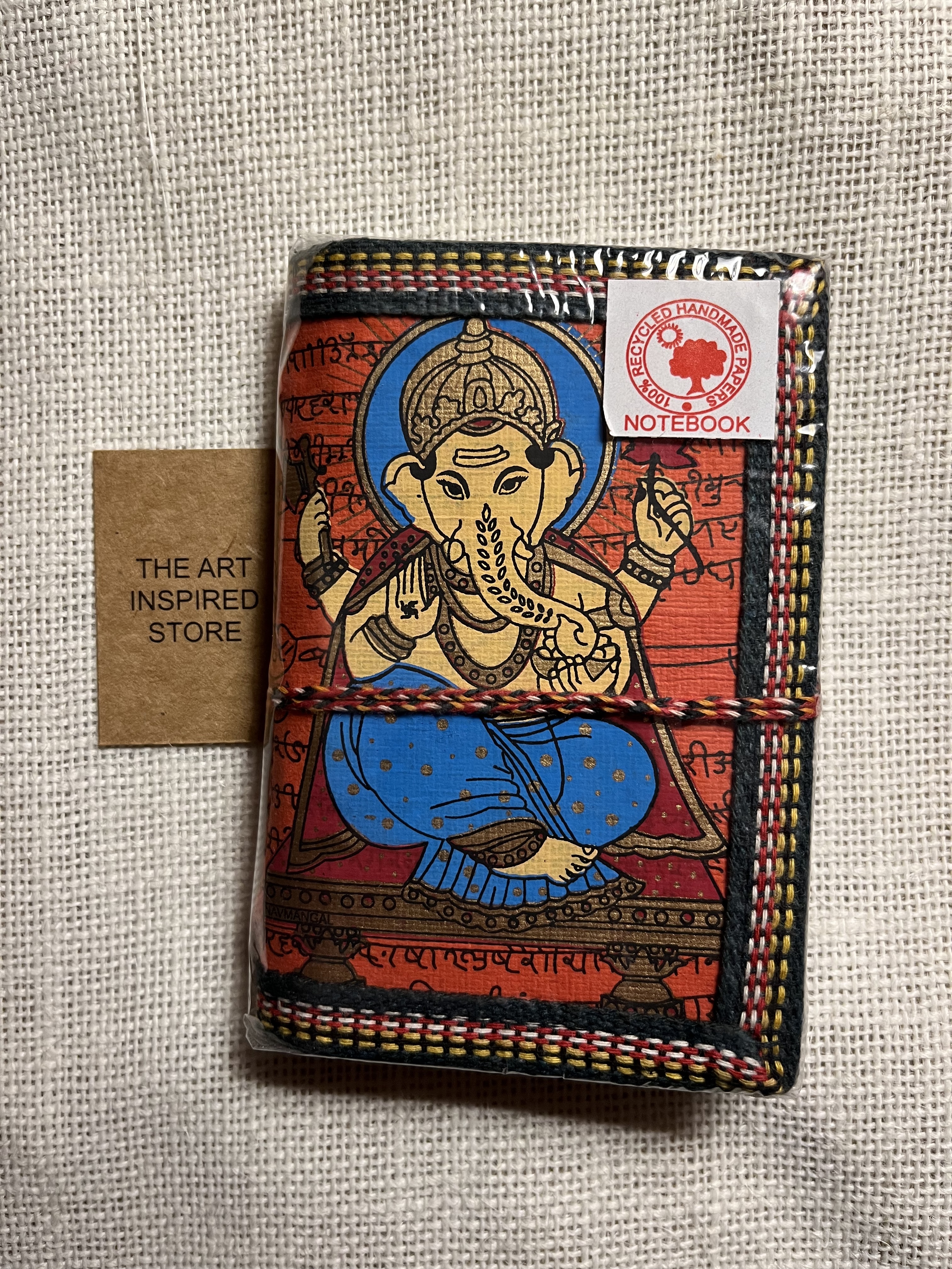 Kaagaz Handcrafted Pocket Notebook | 'Ganesh' Print | A shade of orange