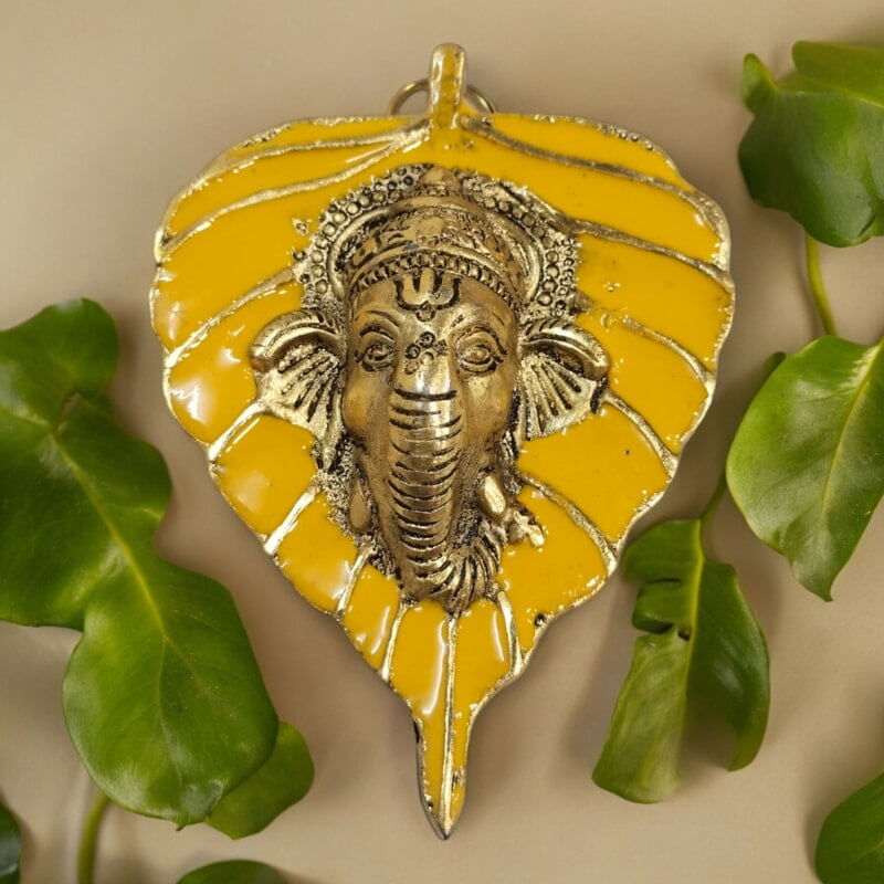 Mini Enamel Leaf Ganesh Yellow color Aluminium Idol Mini Enamel Leaf Ganesh Yellow color Aluminium Idol