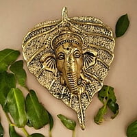 Mini Enamel Leaf Ganesh Gold color Aluminium Idol Mini Enamel Leaf Ganesh Gold color Aluminium Idol