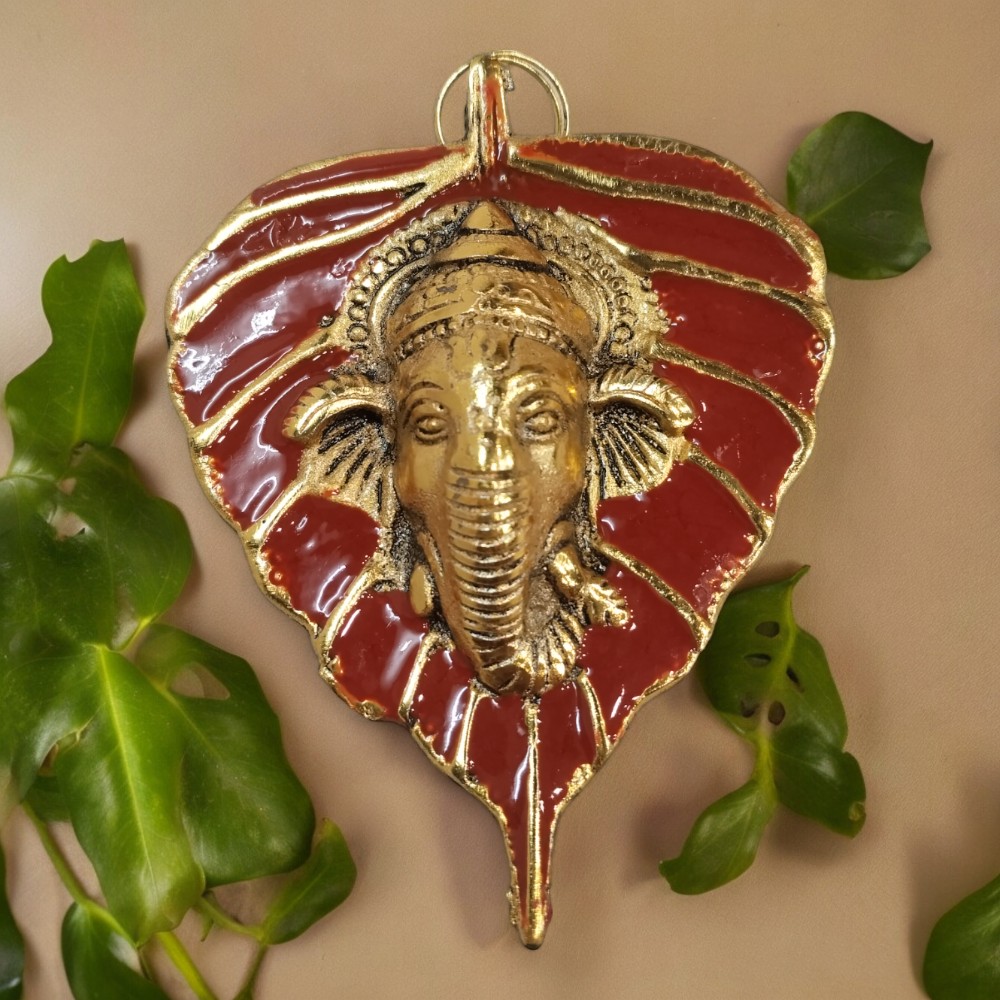 Mini Enamel Leaf Ganesh Red color Aluminium Idol Mini Enamel Leaf Ganesh Red color Aluminium Idol
