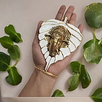 Mini Enamel Leaf Ganesh White color Aluminium Idol Mini Enamel Leaf Ganesh White color Aluminium Idol