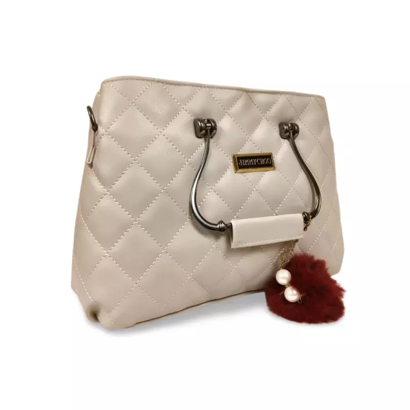 Quilted White Handbag with Metal Handles and Pom Charm
