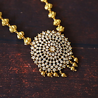Unique round design with ad stone neckpiece