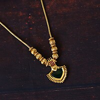 Gold finish flora design with stone neckpiece