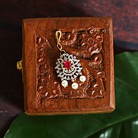 AD stone and rupee tikka