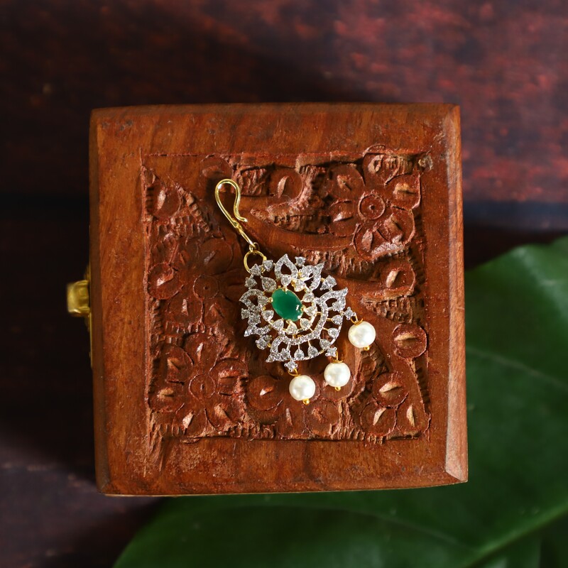 AD stone and rupee tikka