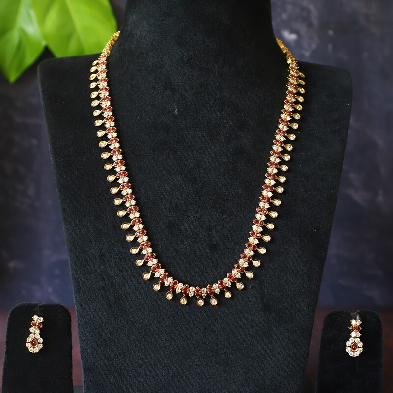 Unique drop design with pretty stone longharam