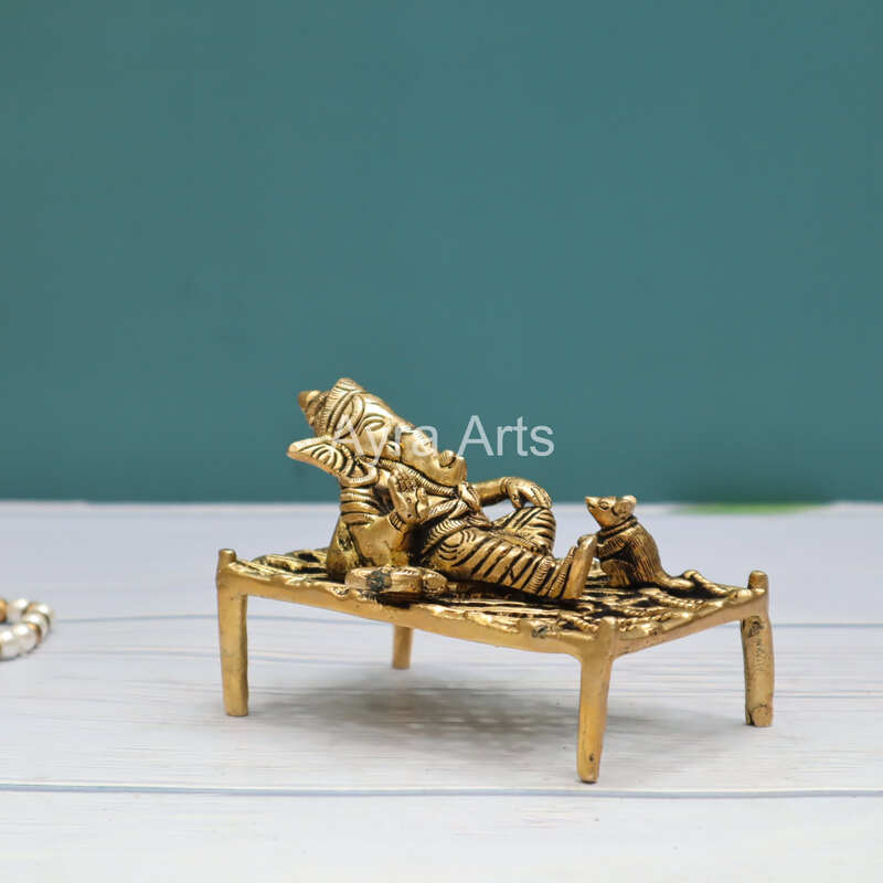 Pure Brass Ganesha Resting On The Charpai Cot - 4.5 Inch Length