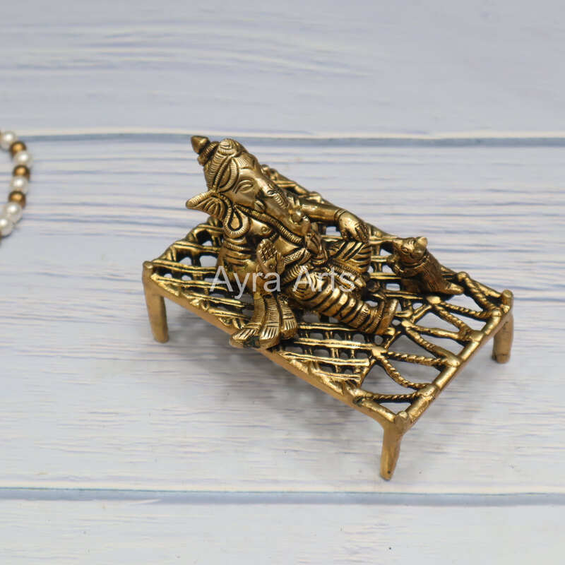 Pure Brass Ganesha Resting On The Charpai Cot - 4.5 Inch Length