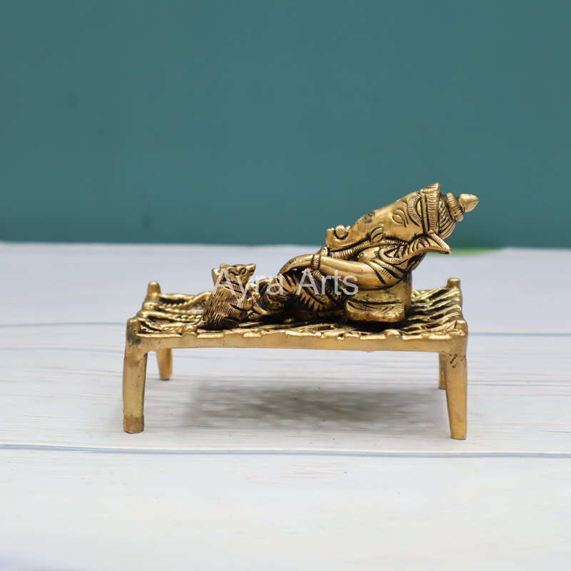 Pure Brass Ganesha Resting On The Charpai Cot - 4.5 Inch Length