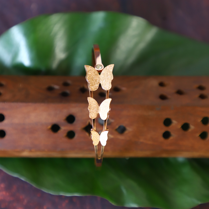 Trendy  gold finish triple butterfly design bracelet