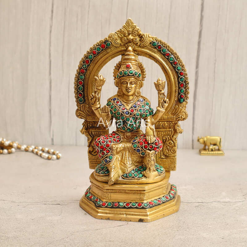 Brass Goddess Lakshmi Seated on Singhasan with Arch in Stonework - 9.5 Inch Height