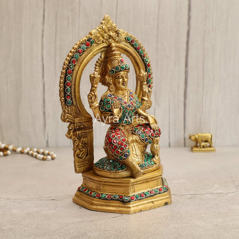 Brass Goddess Lakshmi Seated on Singhasan with Arch in Stonework - 9.5 Inch Height