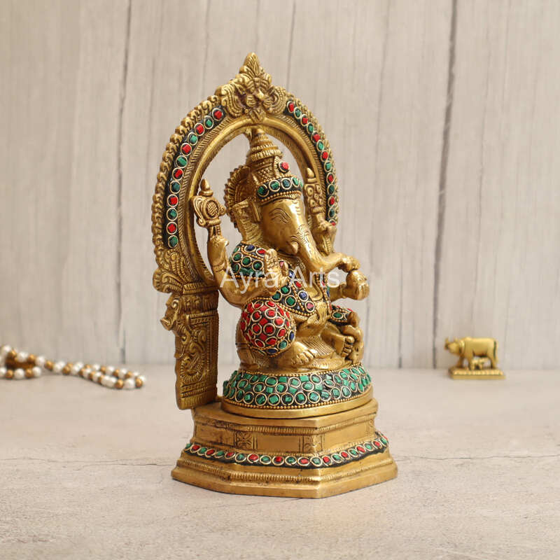 Brass Lord Ganesha Seated on Singhasan with Arch in Stonework - 9.5 Inch Height