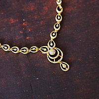 Simple gold finishing neck piece