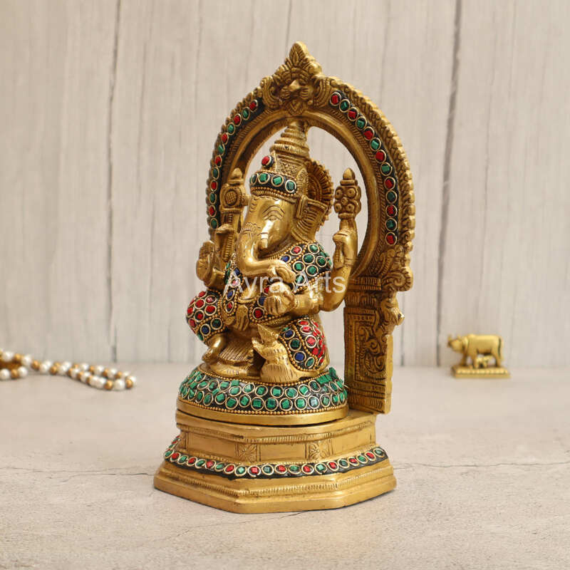 Brass Lord Ganesha Seated on Singhasan with Arch in Stonework - 9.5 Inch Height