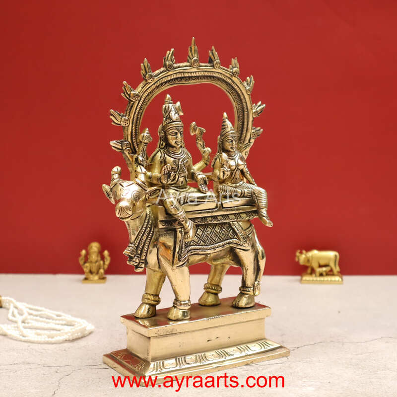 Handmade Shiva Parvati Seated on Nandi Pradosh Nayagar with Prabhavali Idol - 9 inch Height