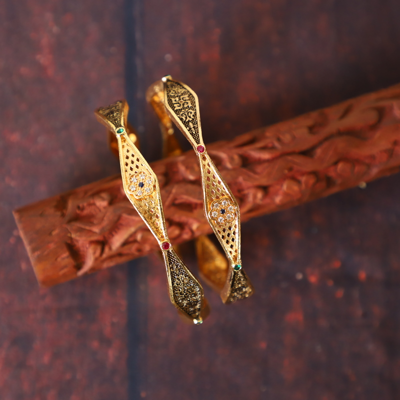 Gold finish unique regular use Bangles