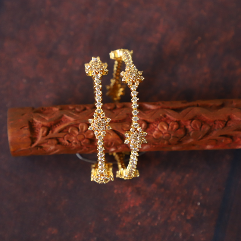 Flora design with ad stone unique design bangle