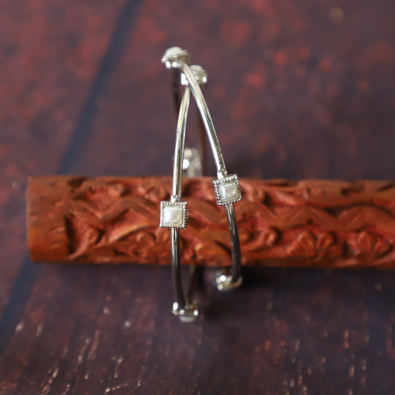 Trendy silver finish with pearl stone bangle