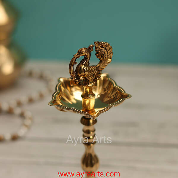 Brass New Design Fancy Peacock Standing Diya vilakku