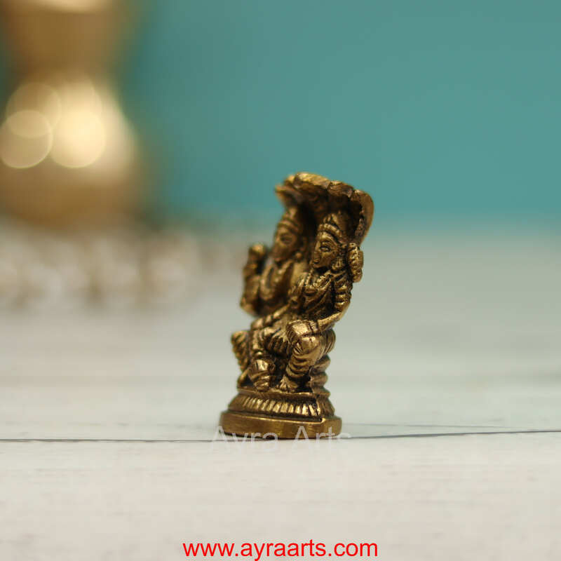 Brass Vishnu Narayan Sitting on Sheshnag with Lakshmi - 2 inch Height