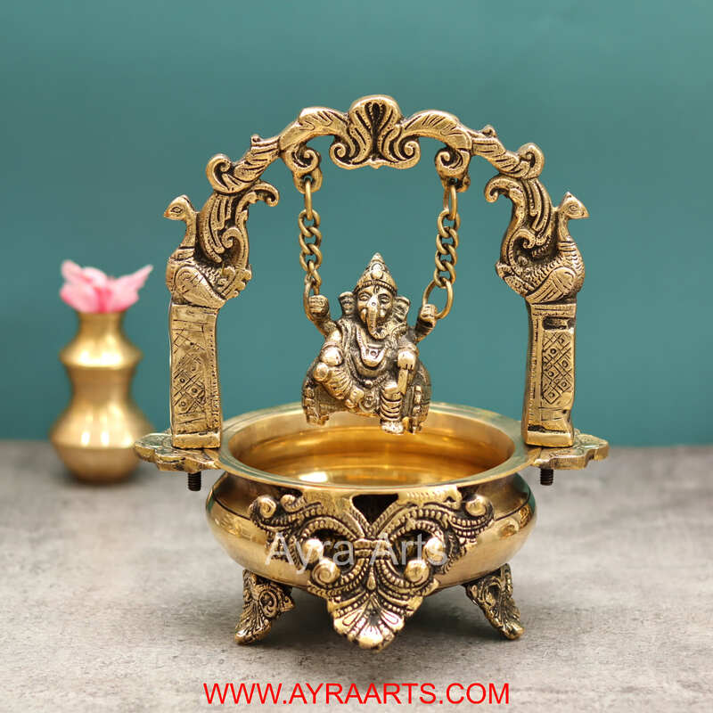 Brass Divine Ganesha Swinging on Urli Decorative Bowl for Pooja Home Decor - 9 Inch Height