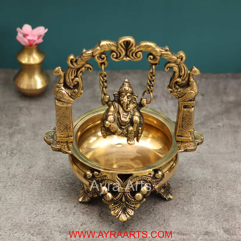 Brass Divine Ganesha Swinging on Urli Decorative Bowl for Pooja Home Decor - 9 Inch Height