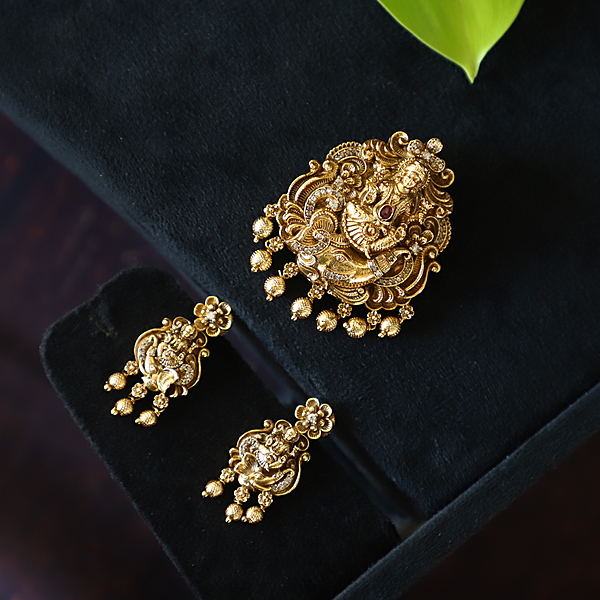 Gold finish lakshmi and elephant pendant & earings